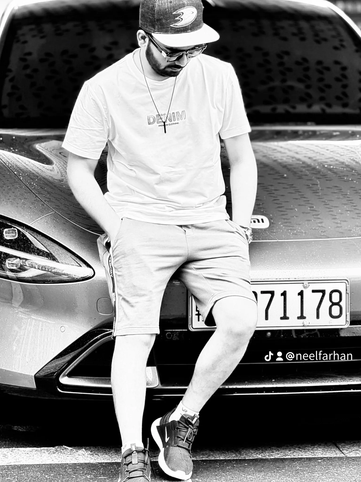 Portrait beside a car